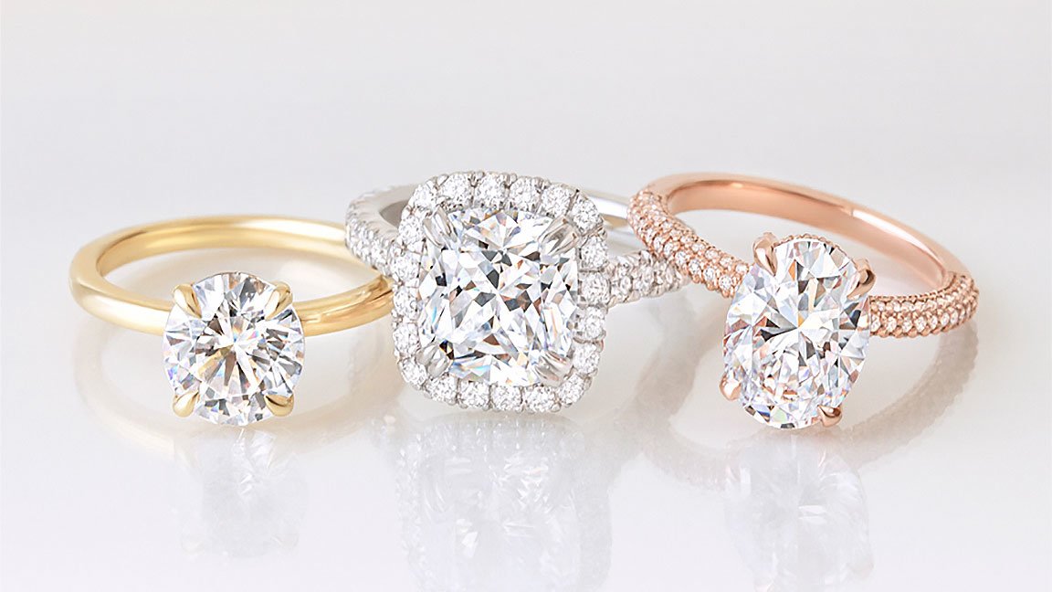 Yellow gold, white gold, and rose gold diamond engagement rings.